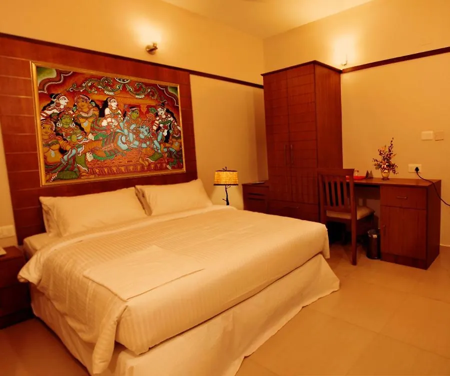 Srivar Hotels Гуруваюр